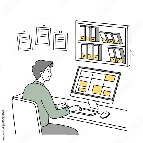 A person working at a computer with papers on the wall and a shelf of binders in the background near desk