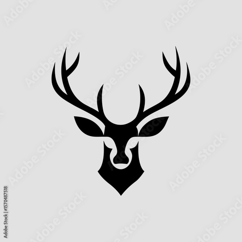 Single color deer head silhouette icon for nature-based use