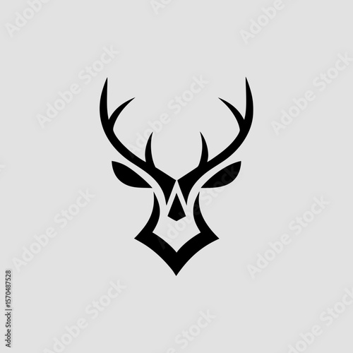Single color deer head silhouette icon for nature-based use