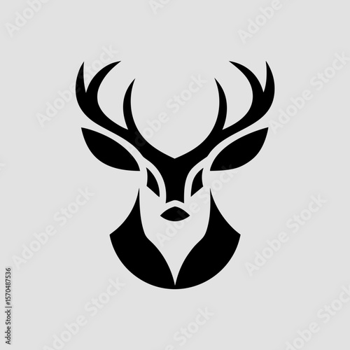 Single color deer head silhouette icon for nature-based use
