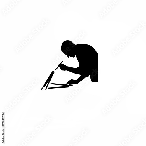 Silhouette of artist sharpening pencil with blade on white background