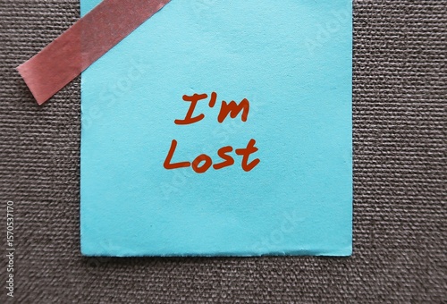 Blue paper note written - I'm Lost - emotionally or mentally confused and don't know what to do - feeling overwhelmed, confused, uncertain how to proceed in life