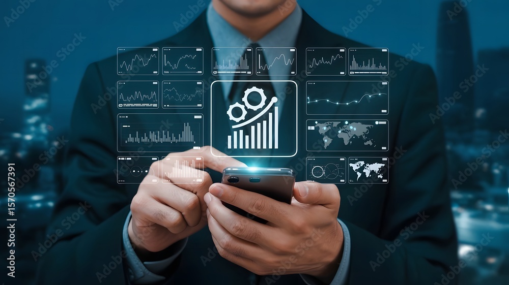 Obraz premium Businessman using smartphone with financial graphs and data analysis overlay