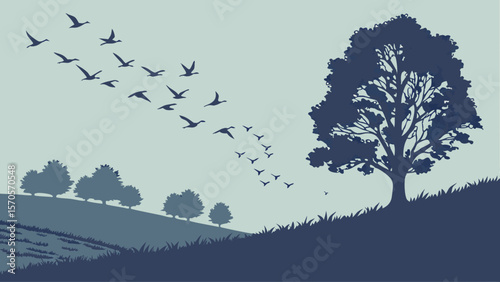 A flock of birds in v formation flies across a serene landscape with rolling hills silhouetted trees and a large majestic tree on a grassy incline under a pale sky