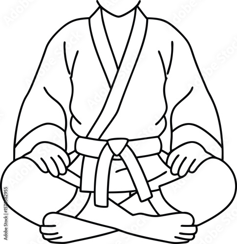 Person in martial arts uniform sitting cross legged belt