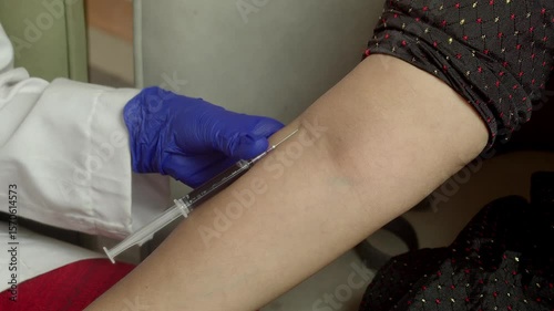 Indian Young Women give blood sample