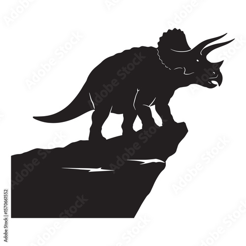 Silhouette of a majestic triceratops dinosaur standing on a rocky cliff edge