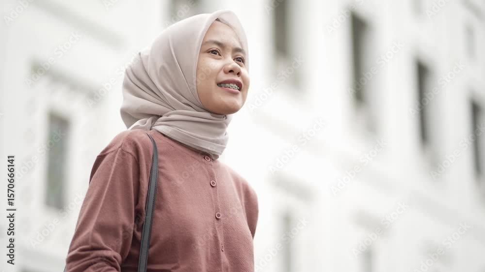 Young Asian Indonesian Woman Walking in Kota Lama or Old Town area Street, Semarang, Indonesia