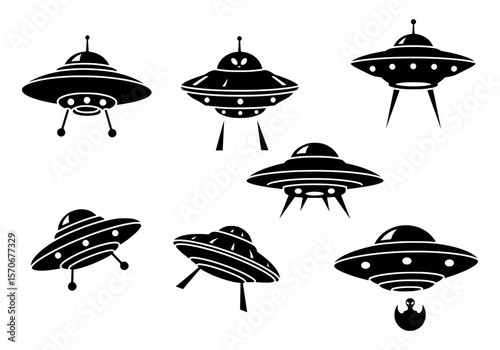 Vector silhouette of collection of stylized flying saucer icons isolated on white background