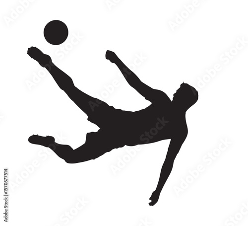 Silhouette of a soccer player performing a bicycle kick with the ball