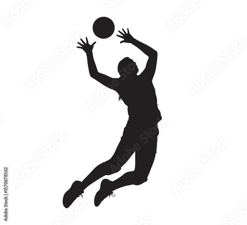 Silhouette of a female volleyball player jumping to hit the ball