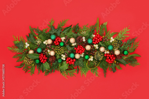 Wallpaper Mural Christmas winter holly berry, mistletoe, ivy, cedar fir, pine cone and glitter bauble decoration on white. Nature flora greenery design for holiday season. Torontodigital.ca