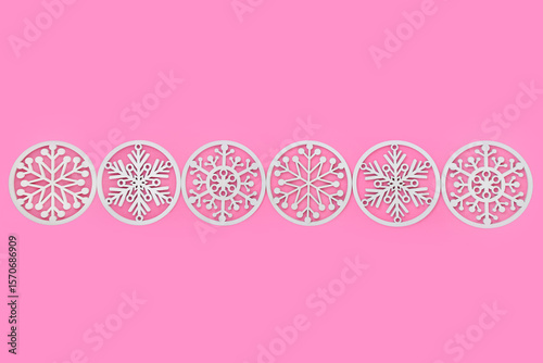 Wallpaper Mural White snowflake Christmas tree decorations background on pink. Natural wooden traditional symbols for decorative gift tag, greeting card, label. Copy space.  Torontodigital.ca