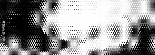 Halftone gradient background transitions from black to white with pixel dots - abstract wave pattern with smooth fade effect. Digital game texture with scattered squares for retro graphic design.