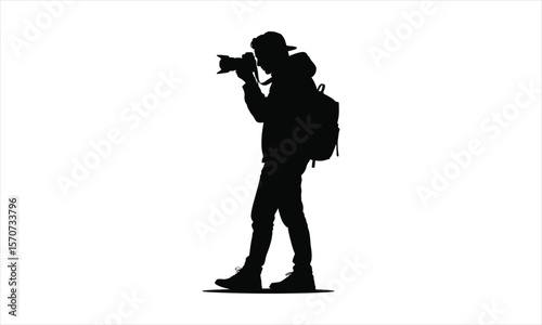 Photographer capturing image silhouette
