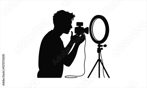 Person recording video with microphone silhouette