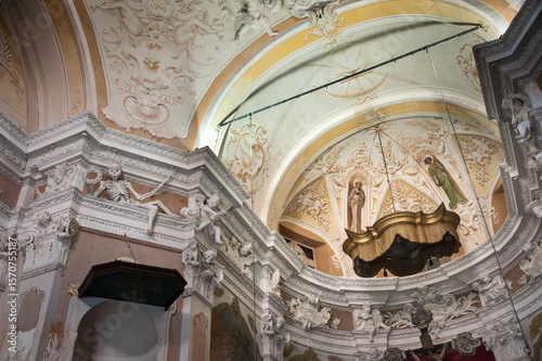 Baroque interior of the church with rich symbolic decor, fresco, sculptures o...