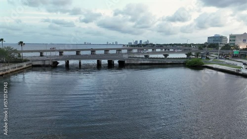 Wallpaper Mural Aerial approaching shot of bridges with driving cars in Tampa, Florida at dusk. Bayshore with skyline in background. Wide shot. Cloudy day in USA. Torontodigital.ca