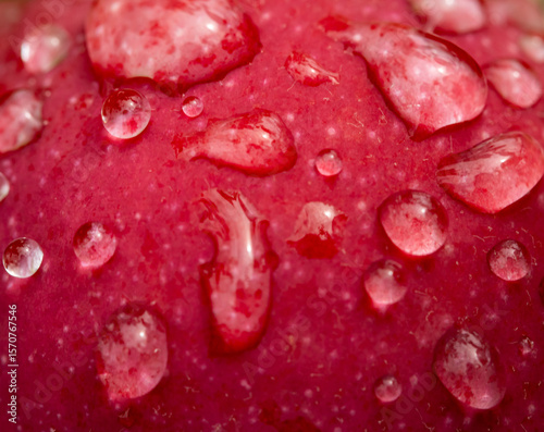 A red apple with drops of water on it