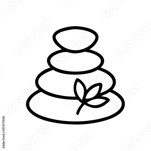 Stacked spa stones with leaves representing relaxation