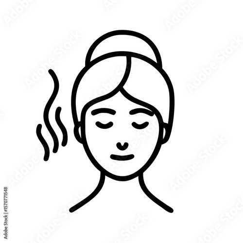 Woman enjoying steam facial treatment for beauty