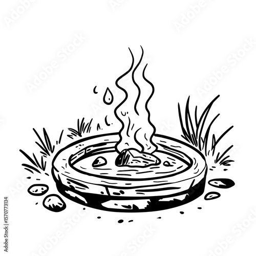 Hot spring with steam rising surrounded by grass and stones  