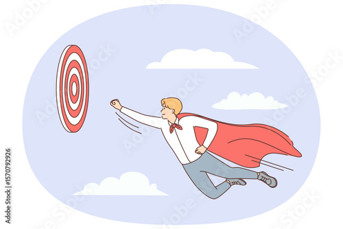 Young purposeful man in superhero cape flies in sky towards target, wanting to reach goal faster