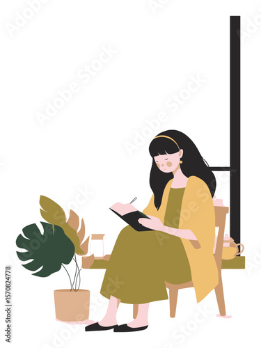 Serene Woman Writing in Journal while Seated on Chair with Plants