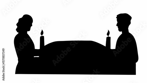 Silhouette of a man and woman on either side of a table with candles in a dark black scene view