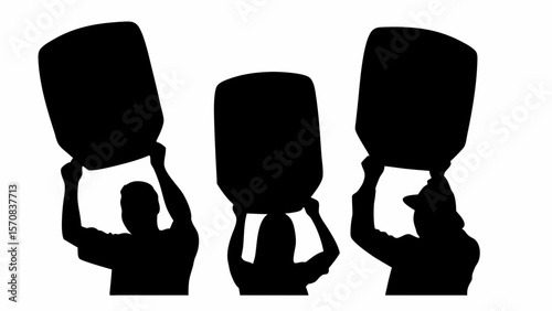Silhouettes of three people holding up large rectangular objects above their heads against white background