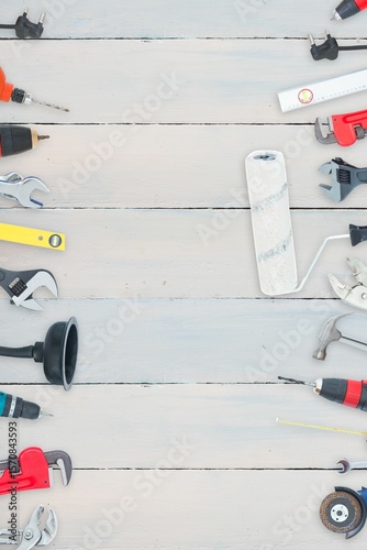 Tools on wooden background