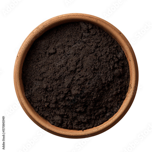 Clay flowerpot filled with rich dark soil