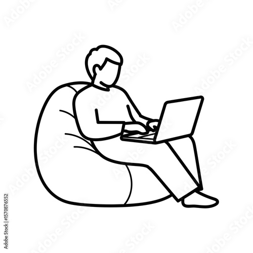 Remote worker using laptop while sitting on a bean bag chair  