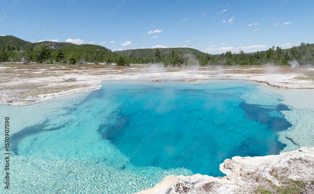 Obraz premium Steaming Geothermal Abyss pool in Yellowstone Park. Wyoming, USA