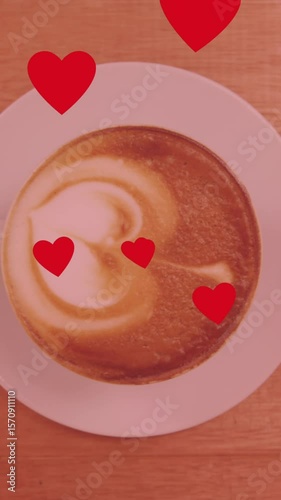 Animation of hearts over cup of coffee