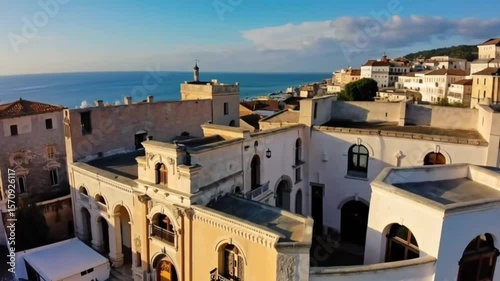 Aerial View: Coastal Italian Town, Sunlit Architecture, Drone Footage