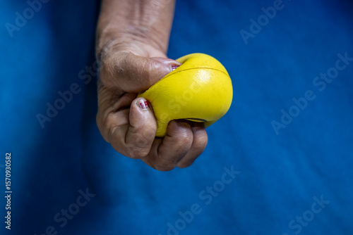 Slika na platnu muscle strengthening exercise with stress ball indoors