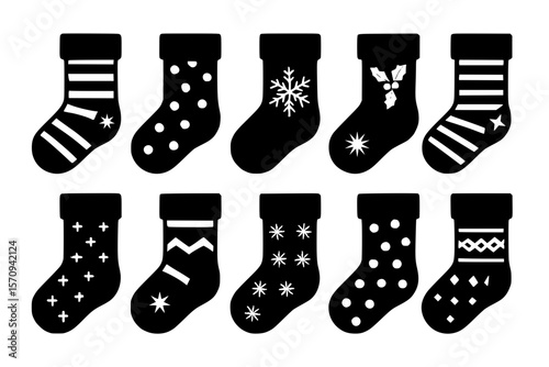 Christmas-themed black stockings with various patterns and designs  