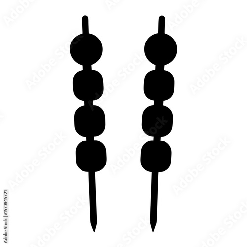 Two skewers of sweet dumplings, black silhouette against a white background