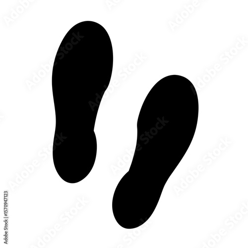 Footprints of life two black human footsteps on a clean white background