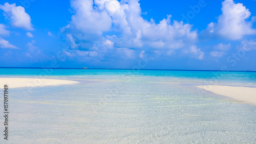 Fototapeta Naklejka Na Ścianę i Meble -  Aerial view in the island with white sand beach as coastline in summer Maldives