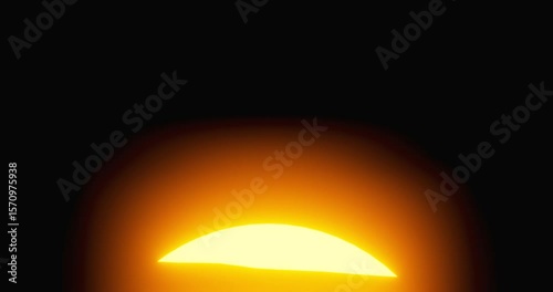 The sun rises over the horizon with reflection on the ocean surface