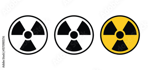 Three radiation warning symbols in black and white and yellow