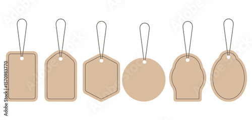 Collection of six different shaped blank kraft paper tags with strings on white background