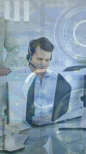 Animation of data processing over caucasian senior businessman talking to his junior colleagues