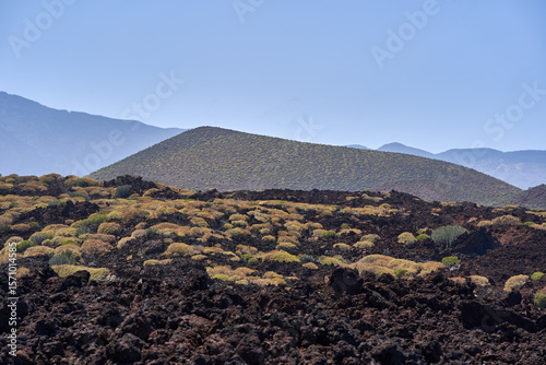 Volcanic cone with arid terrain