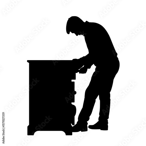 Silhouette of cabinetmaker assembling drawer, precision joinery craft