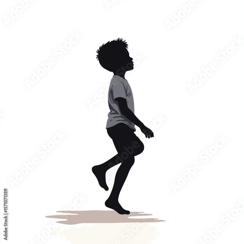 Young boy joyfully balancing on tiptoes in minimalist space, self-expression