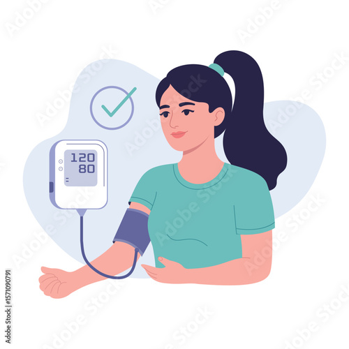 Young Woman Measuring Blood Pressure With Electronic Monitor at Home