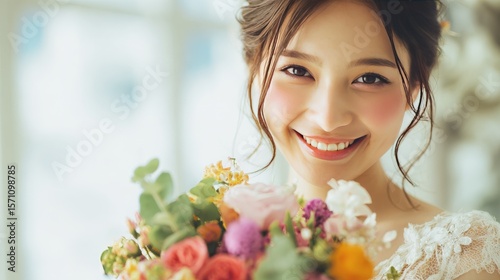Beautiful Young Woman Holding Bouquet of Flowers
